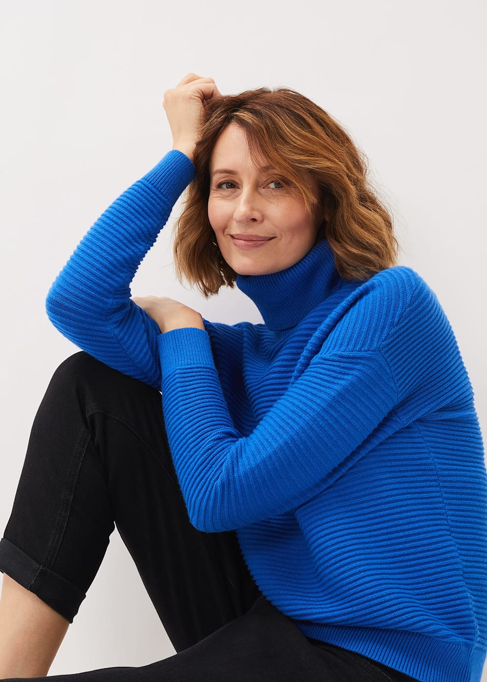 Blue polo neck jumper discount