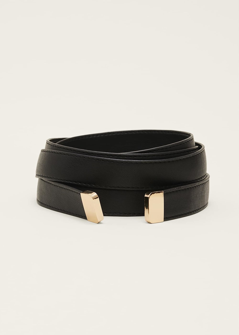 Wrap around belt outlet