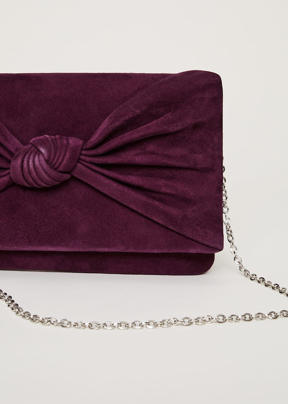 Plum coloured clutch bag on sale