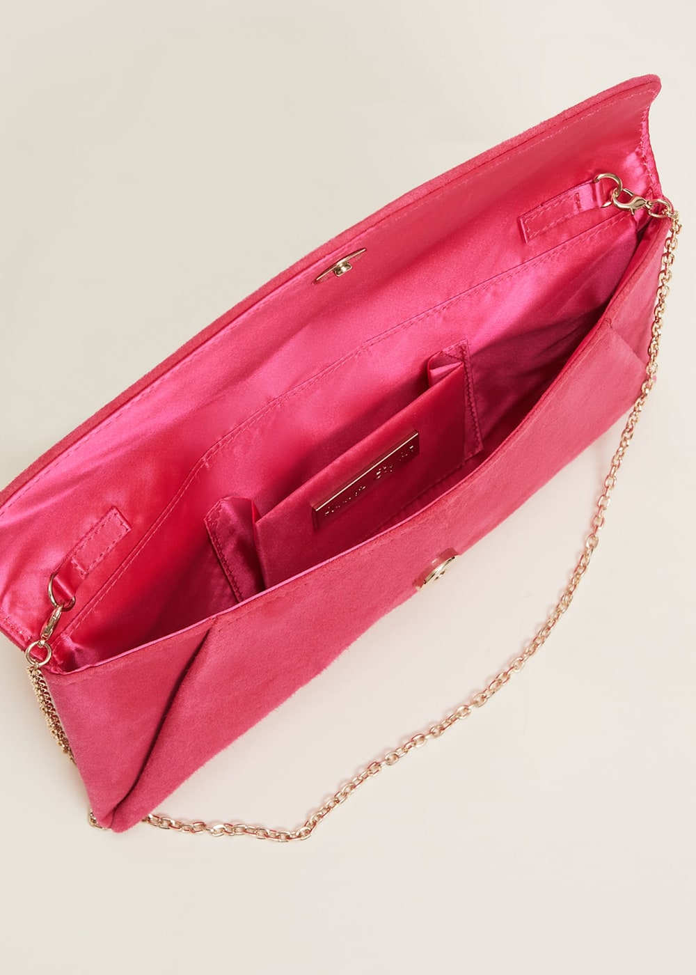 Dark pink suede clutch bag top