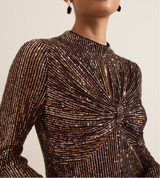 Woman wearing Phase Eight sequin dress