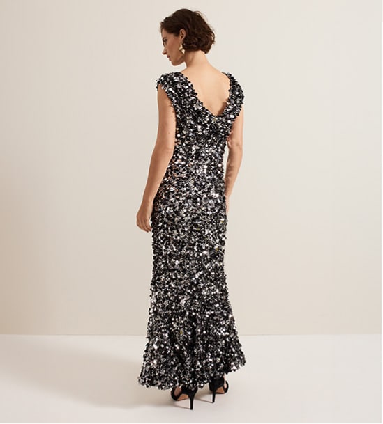 Woman wearing Phase Eight sequin dress