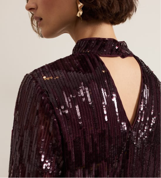 Woman wearing Phase Eight sequin top