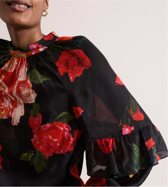 Woman wearing Phase Eight floral top