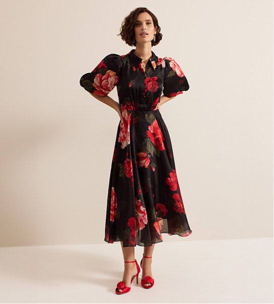 Woman wearing Phase Eight floral dress