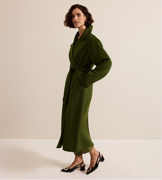 Woman wearing Phase Eight olive coat