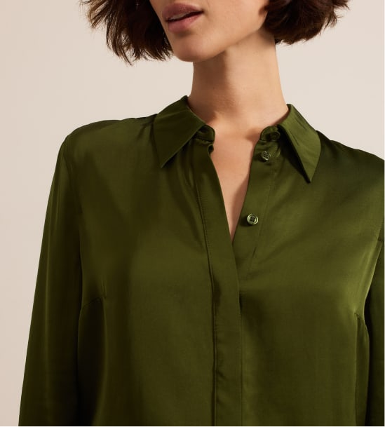 Woman wearing Phase Eight olive top