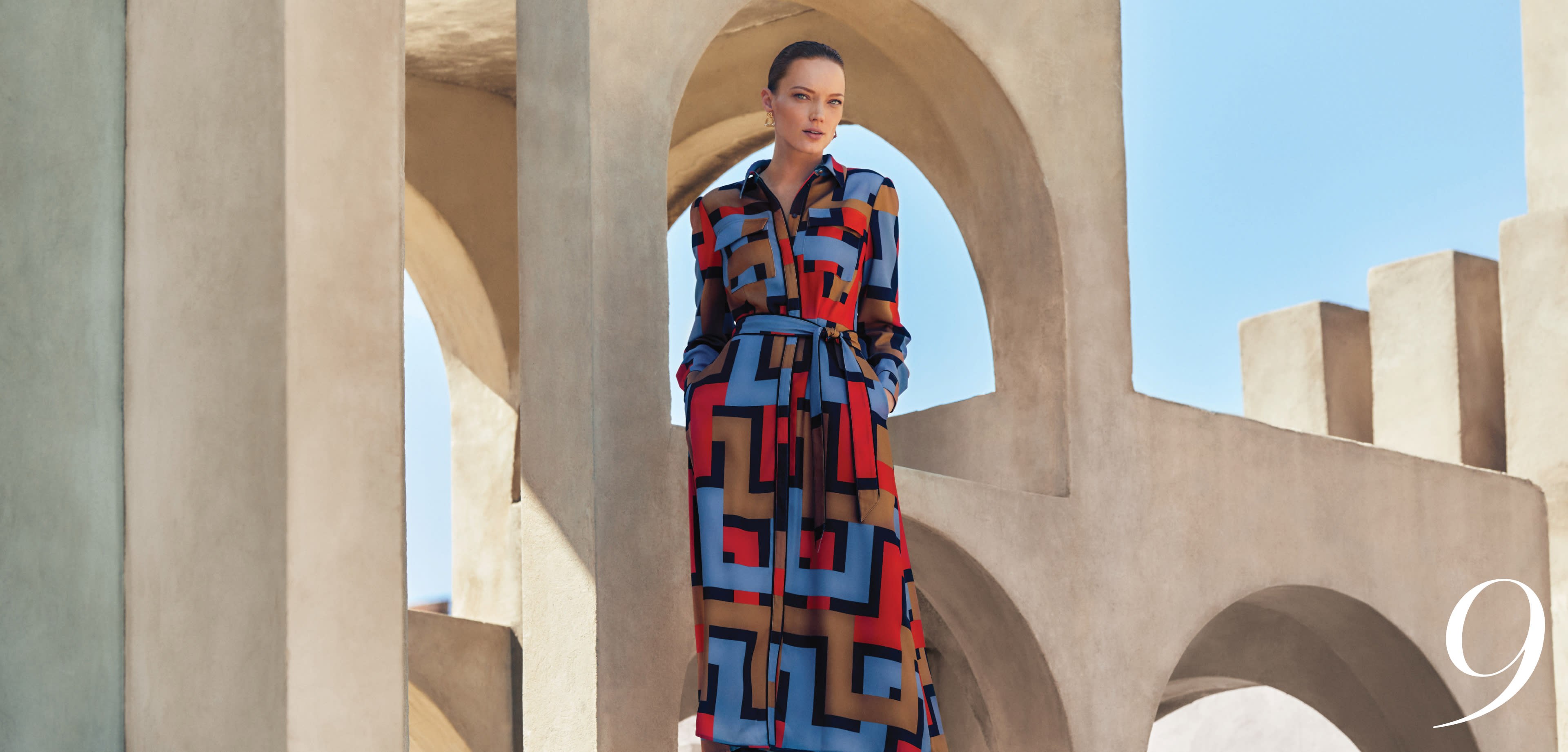 Woman wearing Phase Eight geo shirt dress