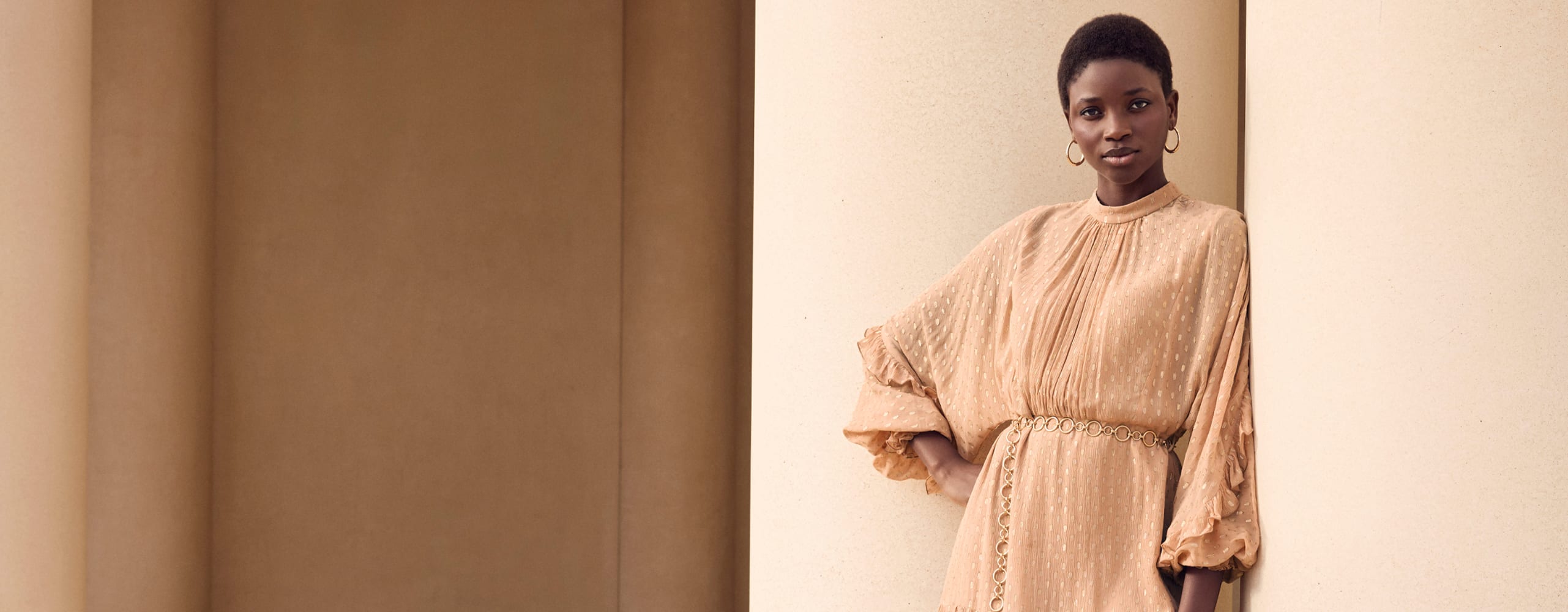 Woman wearing Phase Eight dress