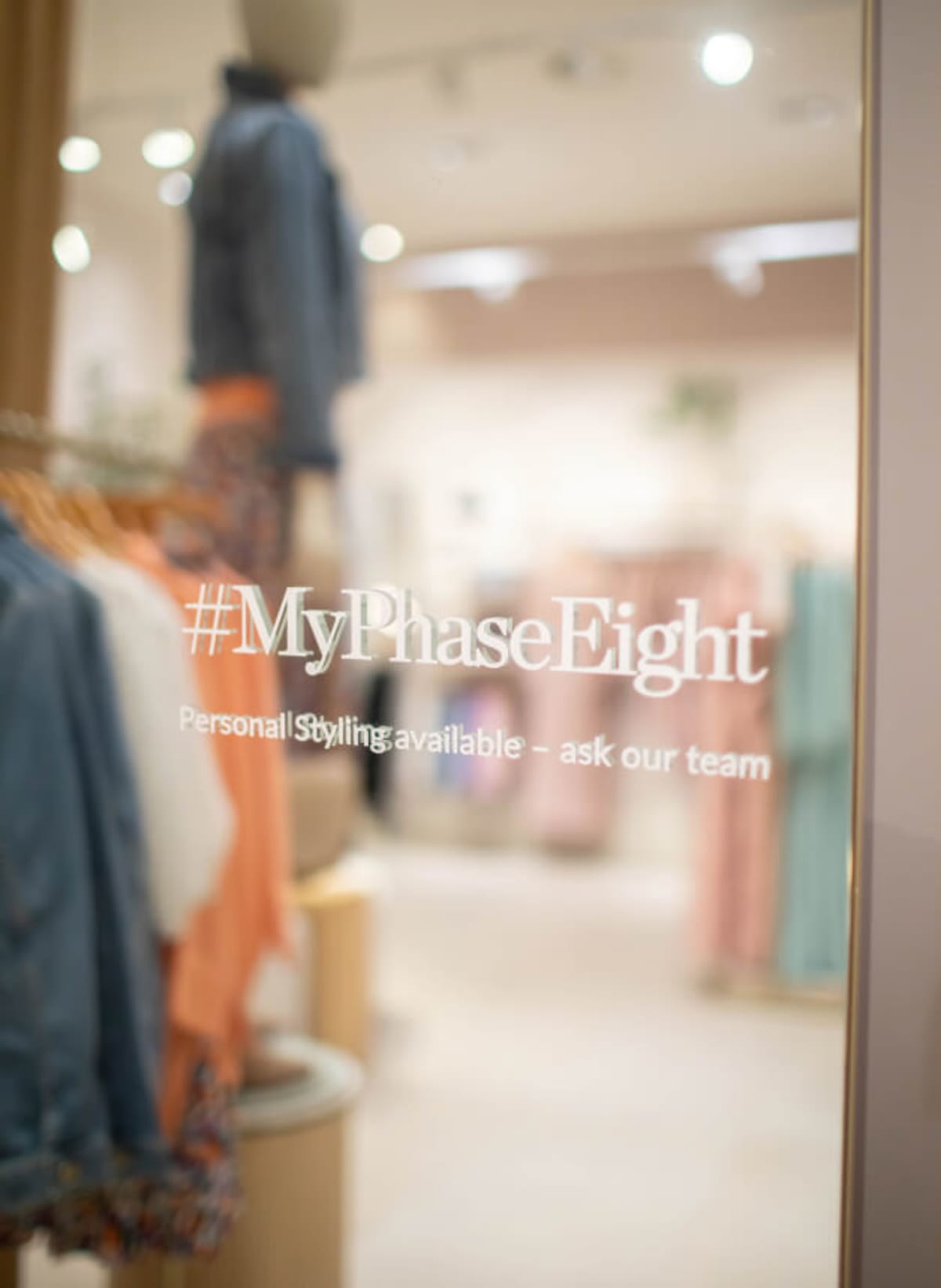 #MyPhaseEight sticker on a mirror in a store