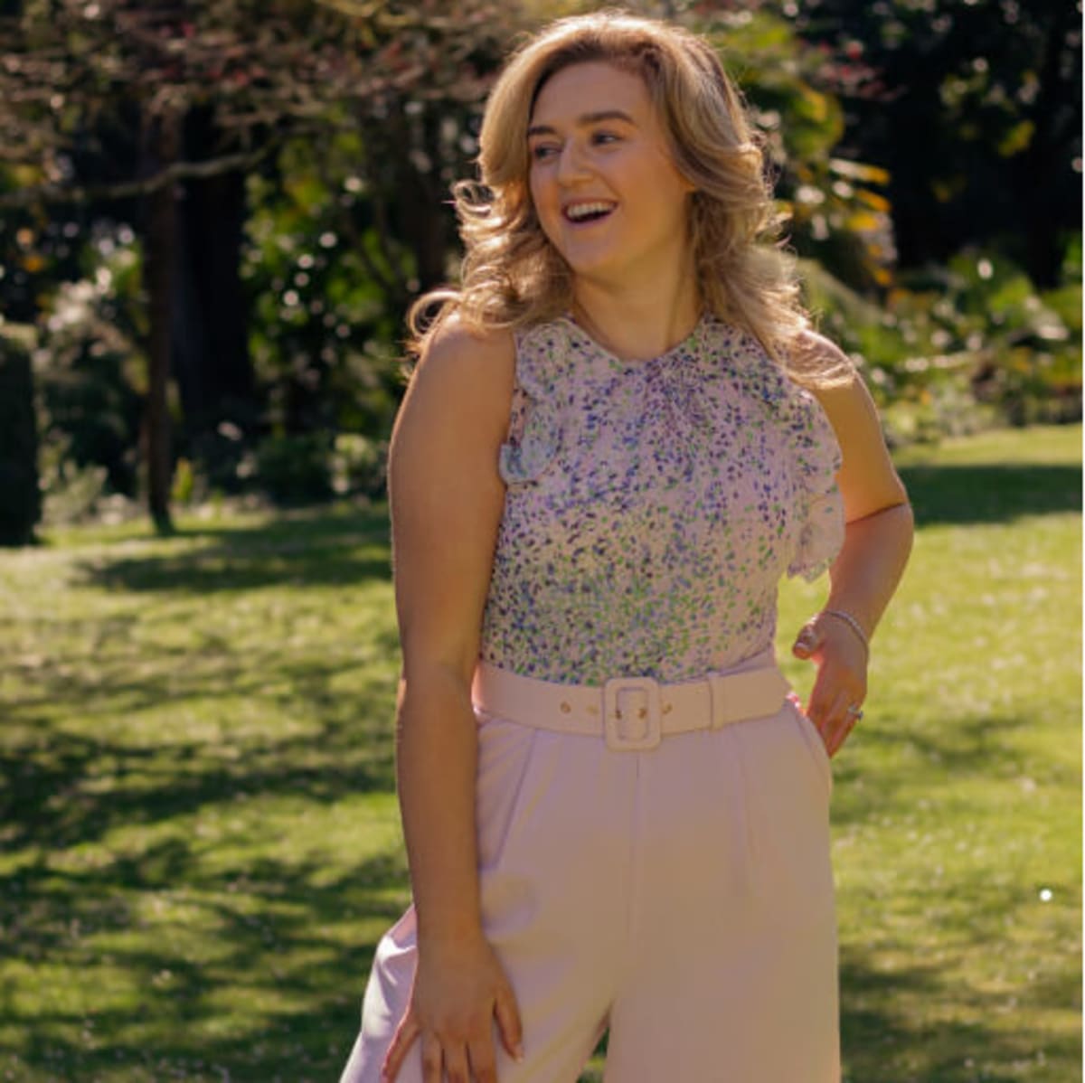 Woman wearing floral jumpsuit