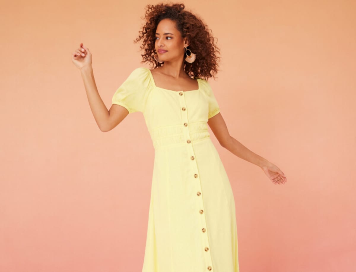 Woman wearing yellow linen dress