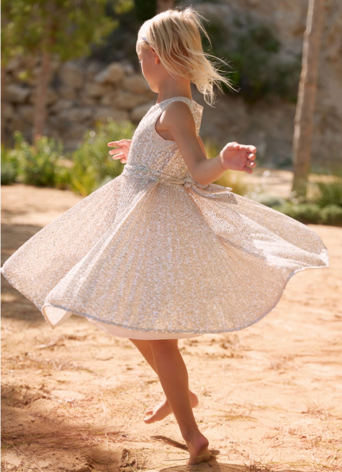 Child wearing Phase Eight Childrenswear Tiana Dress