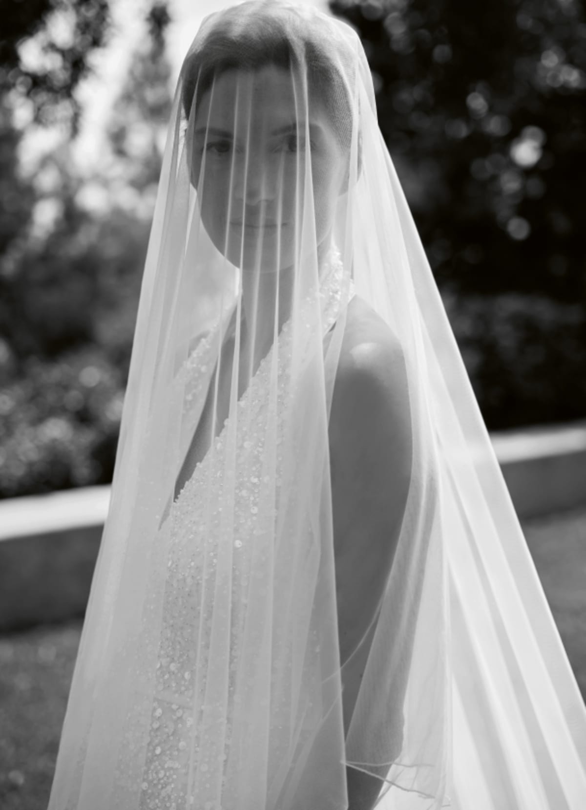 Woman wearing Phase Eight Guinevere Wedding Dress