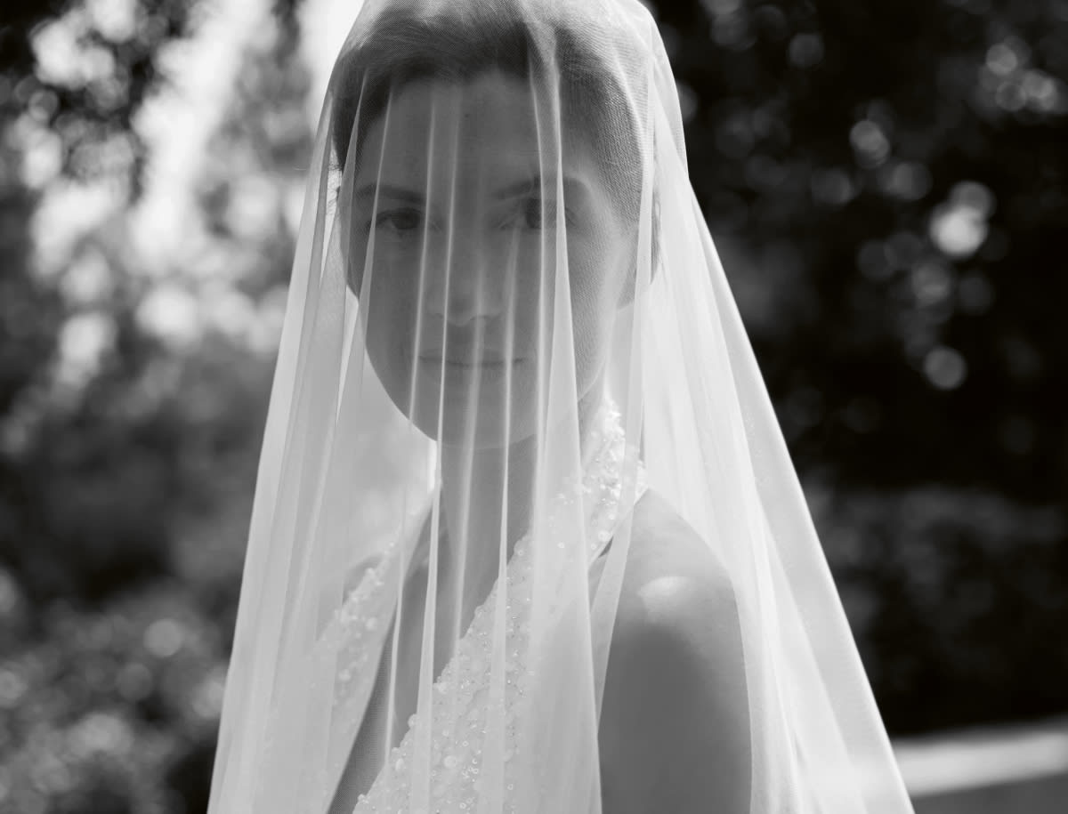Woman wearing embellished wedding dress