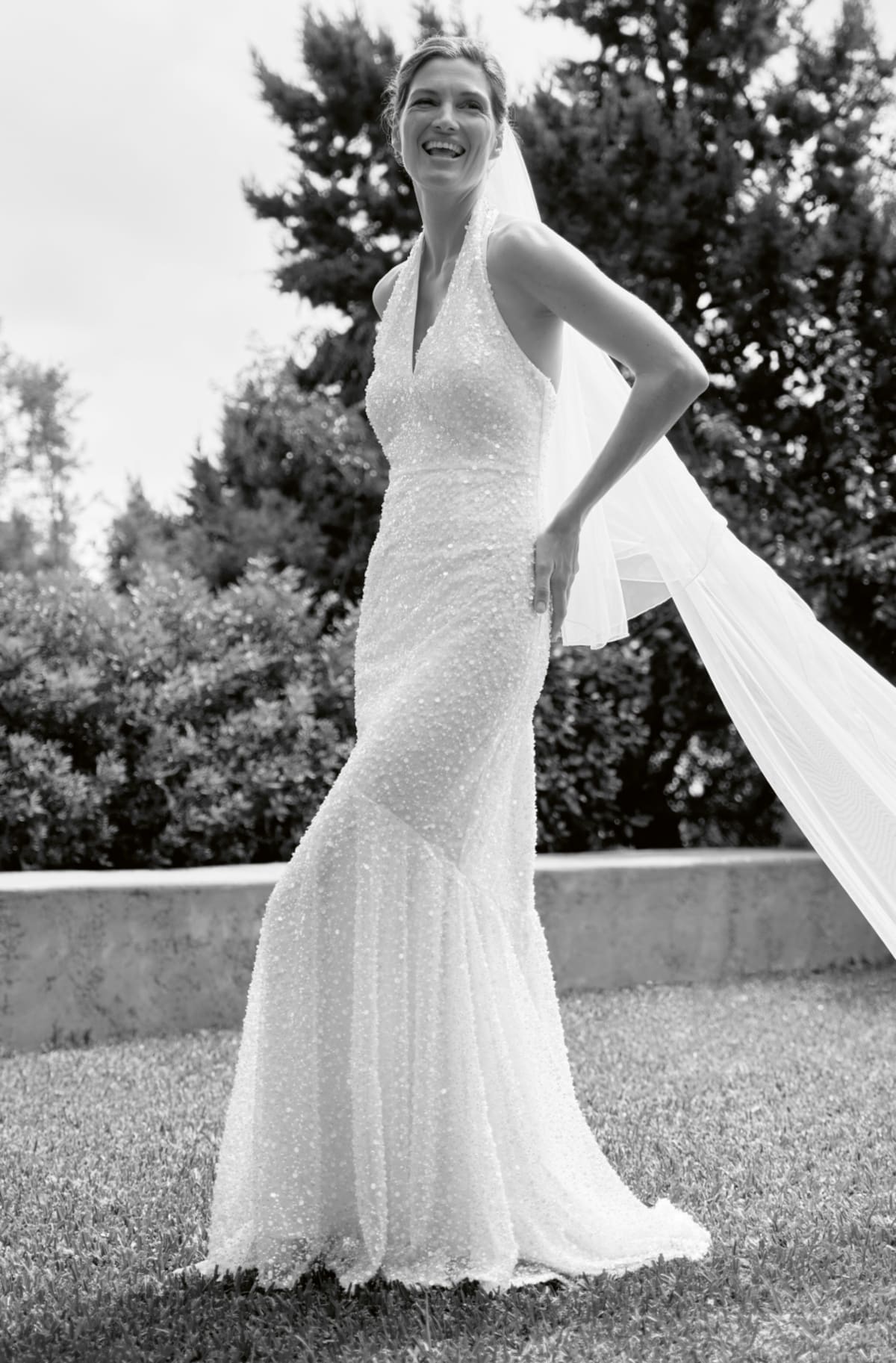  Woman wearing Phase Eight Guinevere Wedding Dress