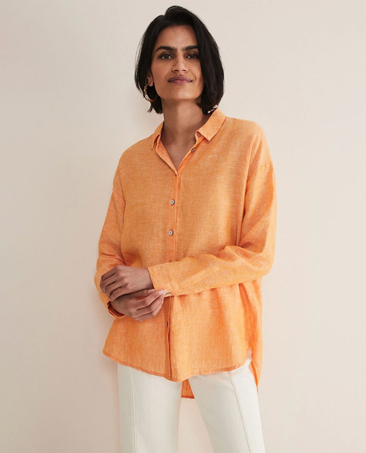 Woman wearing orange shirt