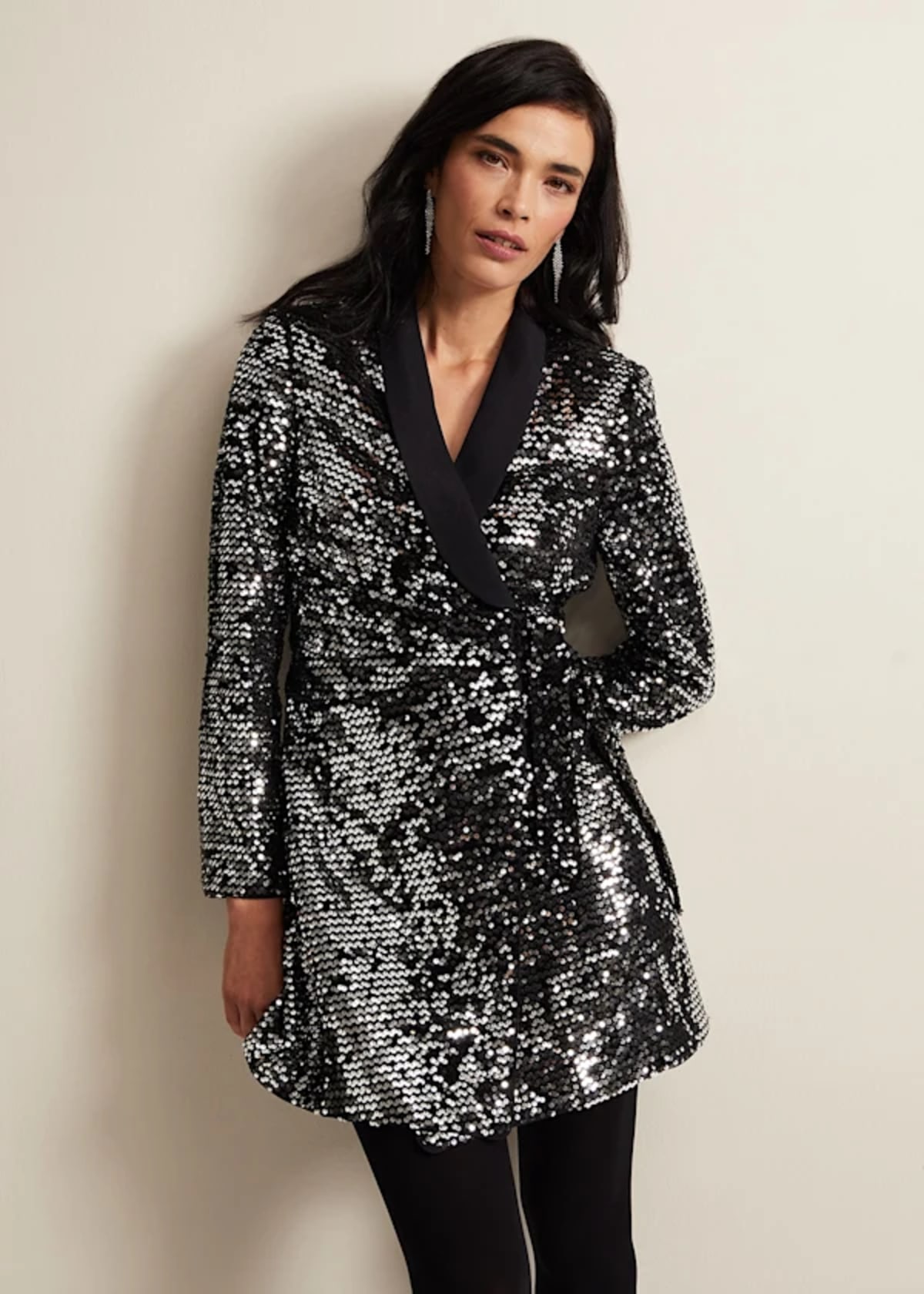 Woman wearing Phase Eight sequin dress