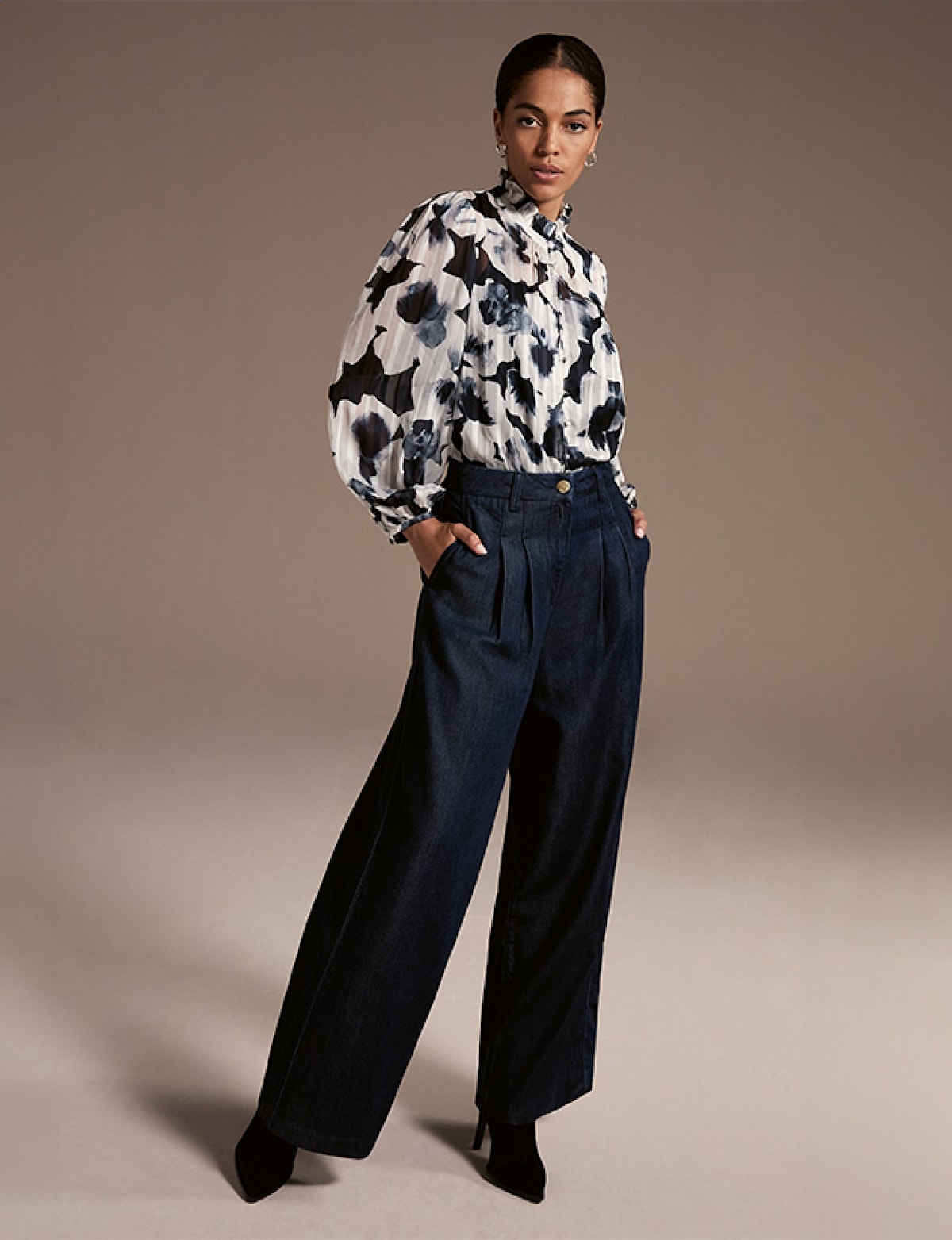 Woman wearing Phase Eight blouse and trousers