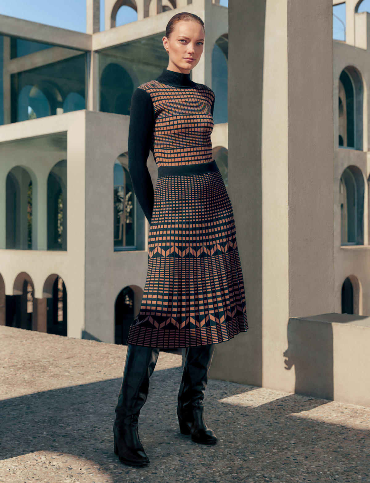 Woman wearing Phase Eight knitted dress