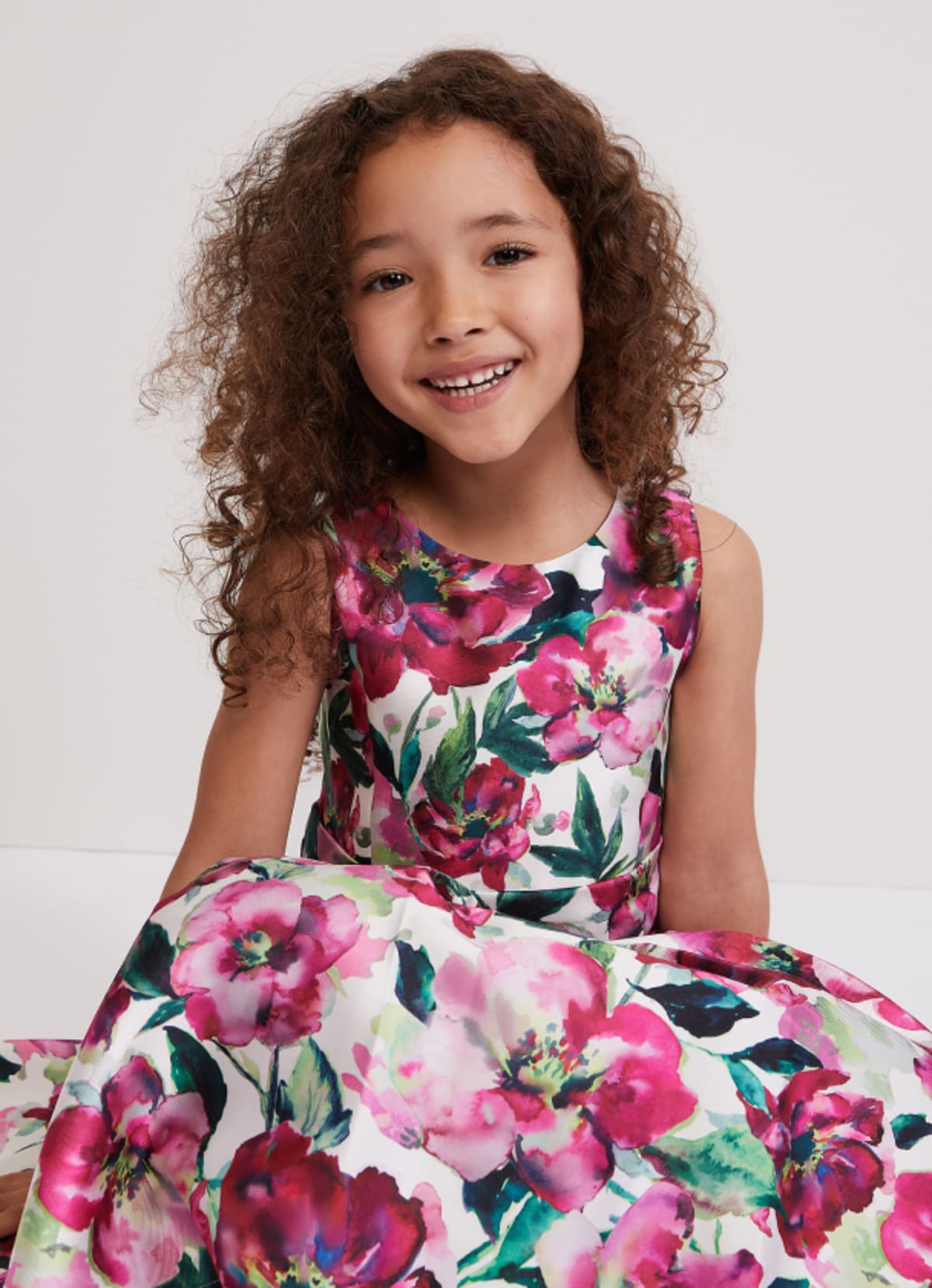Girl wearing Phase Eight dress