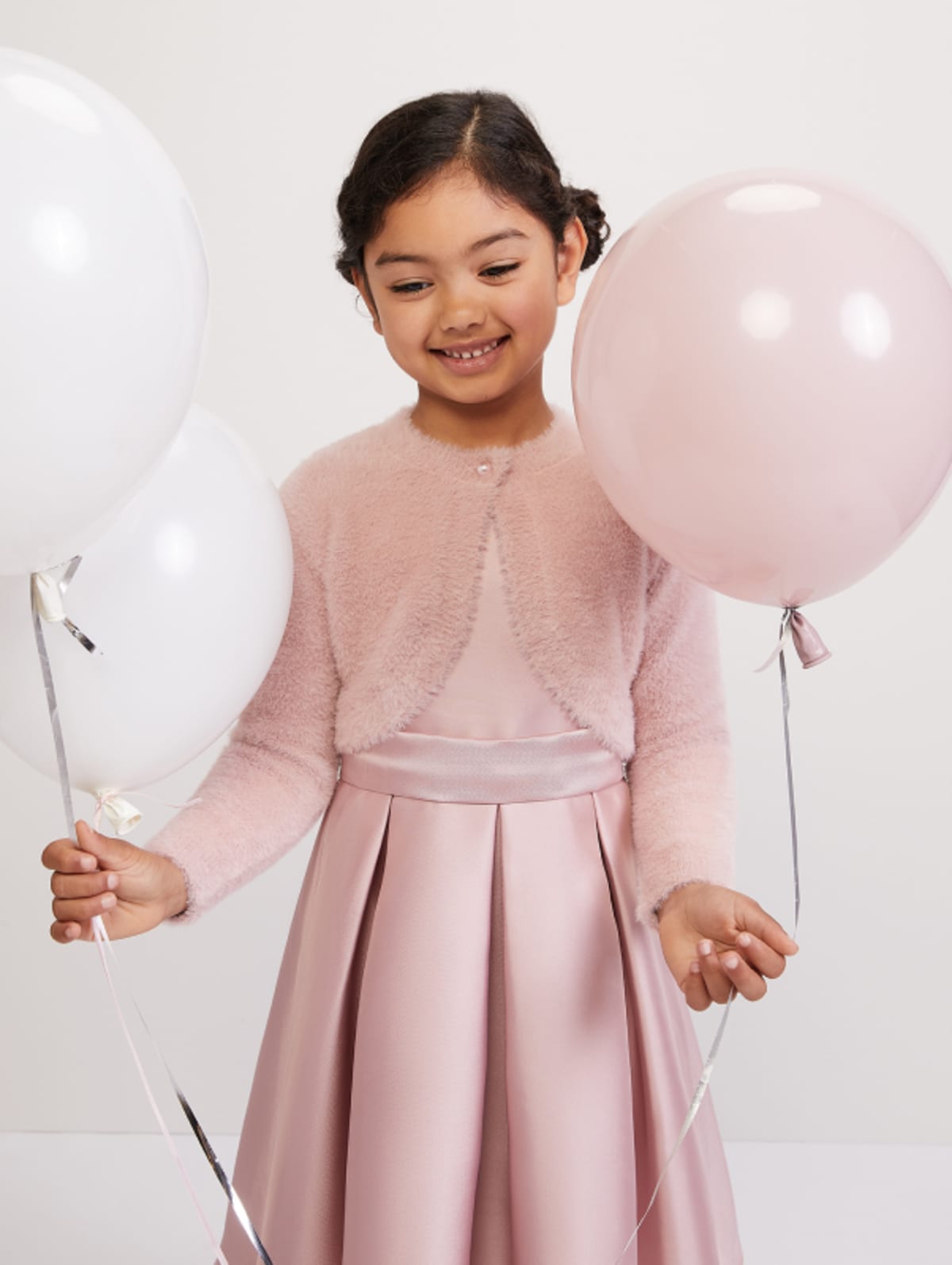 Girl wearing Phase Eight occasion dress