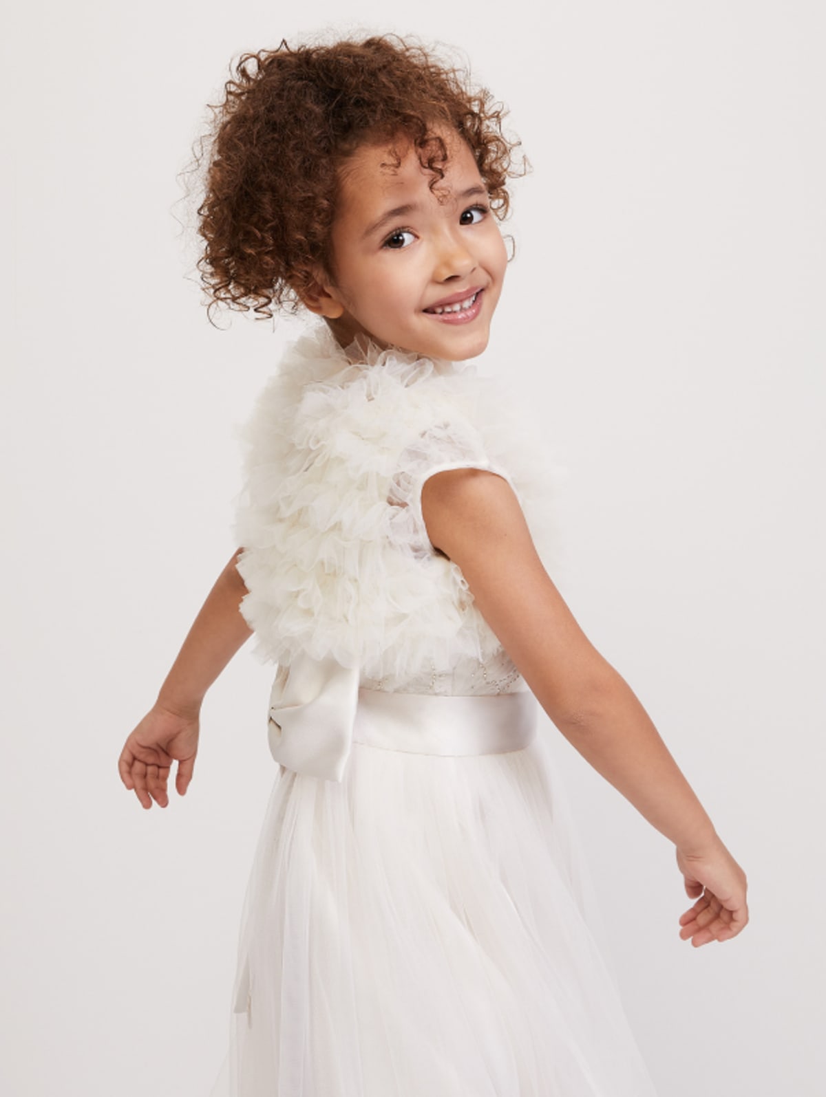 Girl wearing Phase Eight occasion dress
