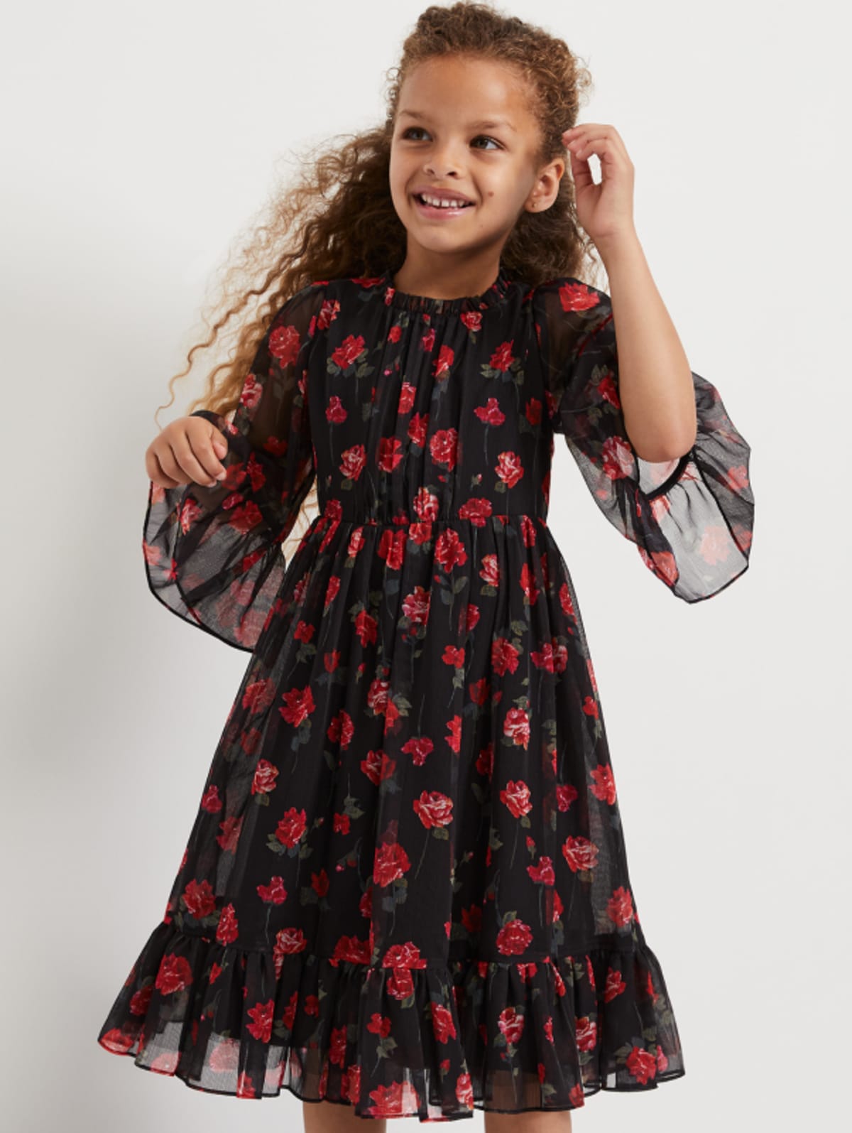 Girl wearing Phase Eight occasion dress