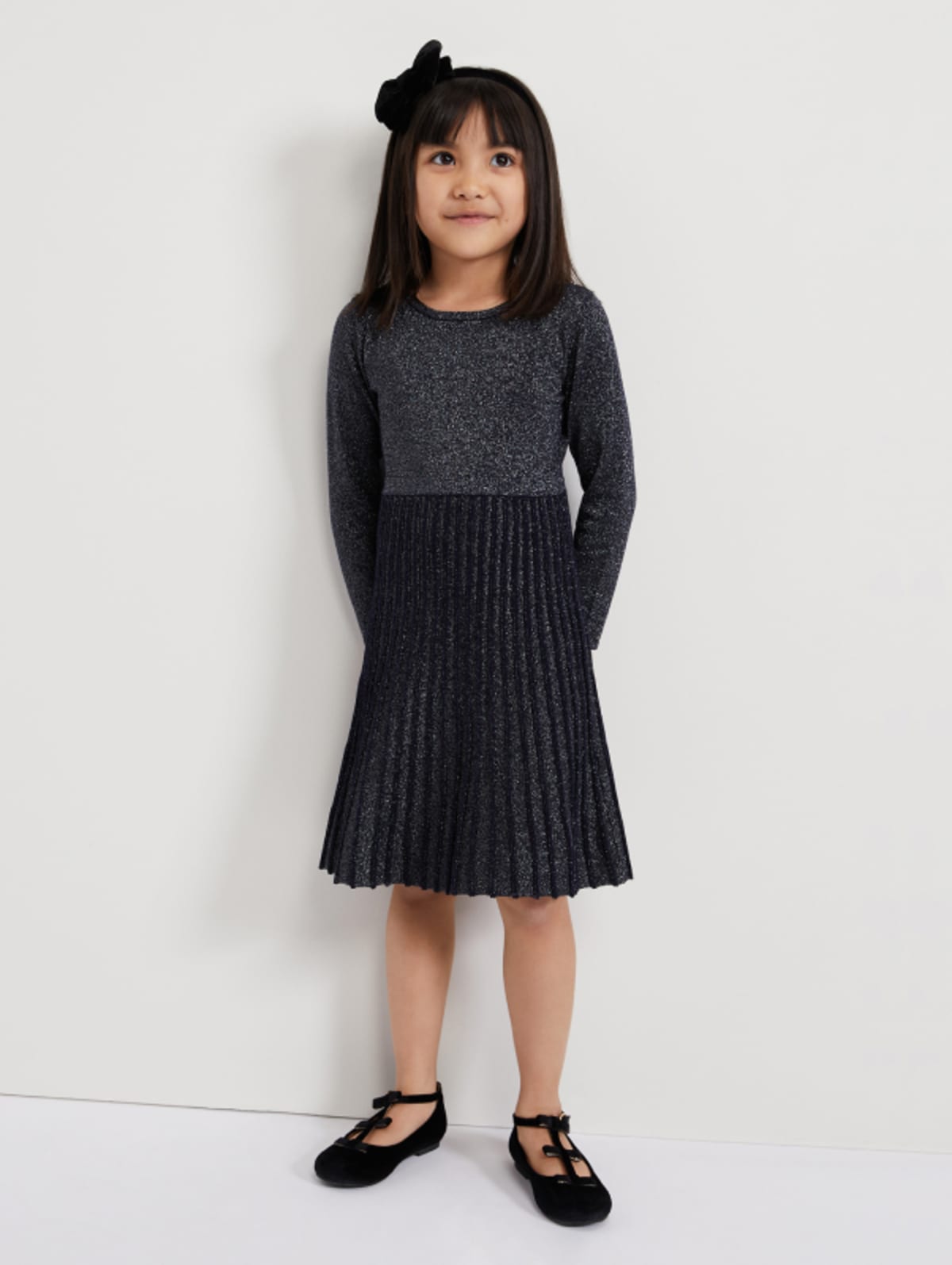 Girl wearing Phase Eight occasion dress