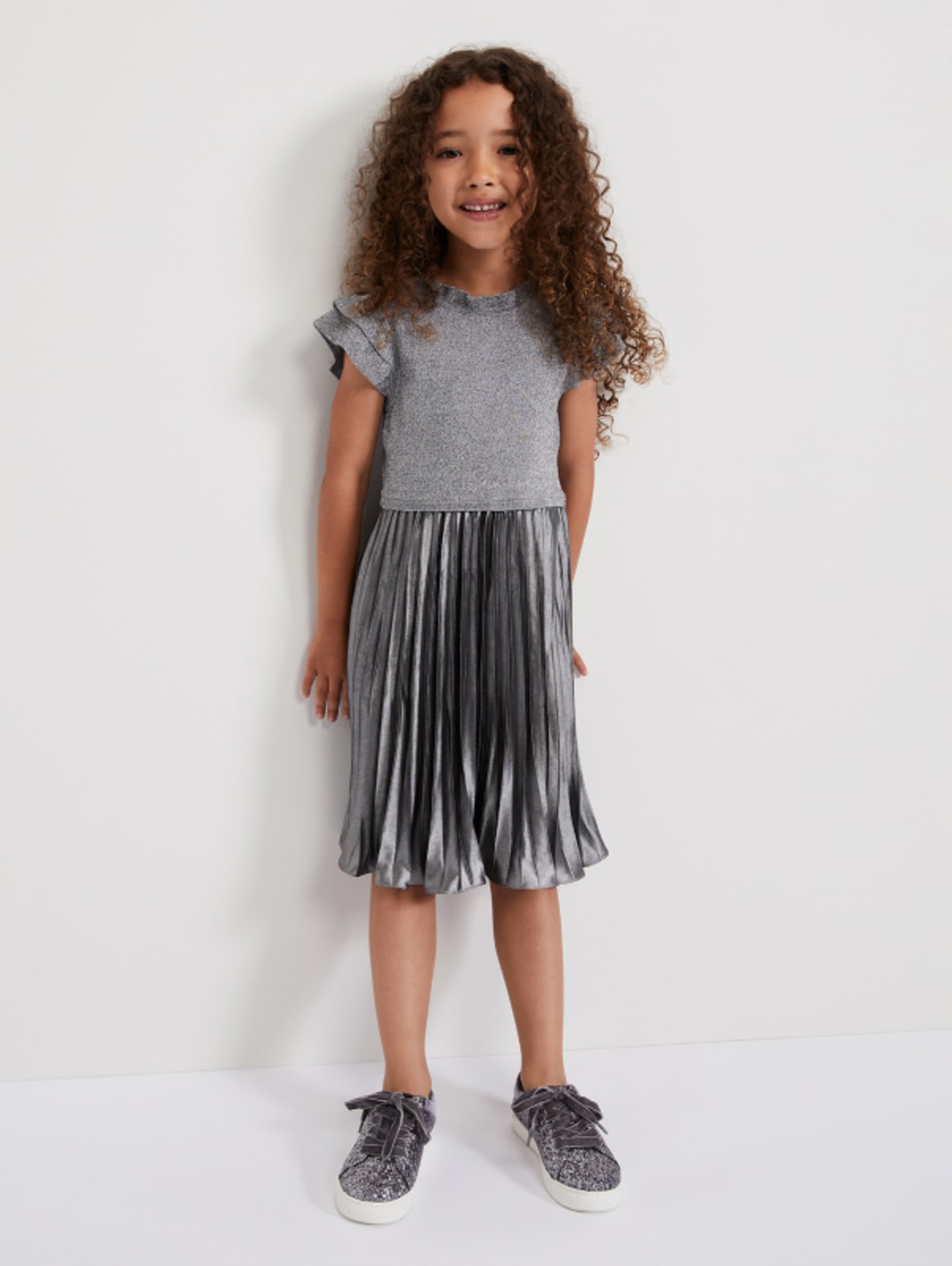 Girl wearing Phase Eight occasion dress