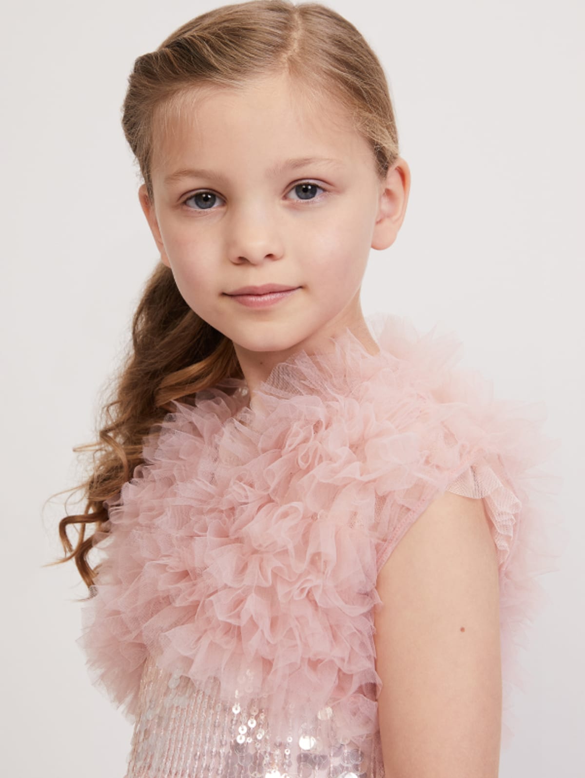Girl wearing Phase Eight occasion dress