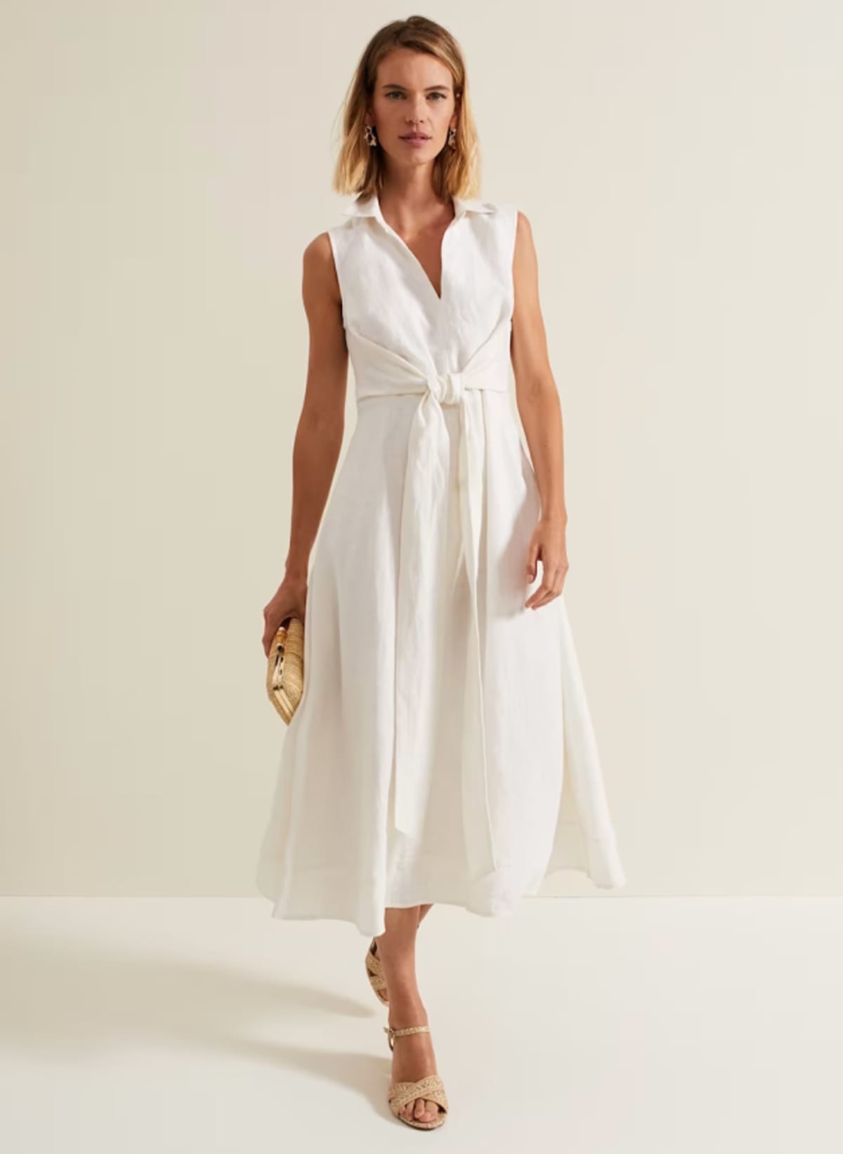 Woman wearing Phase Eight white summer dress