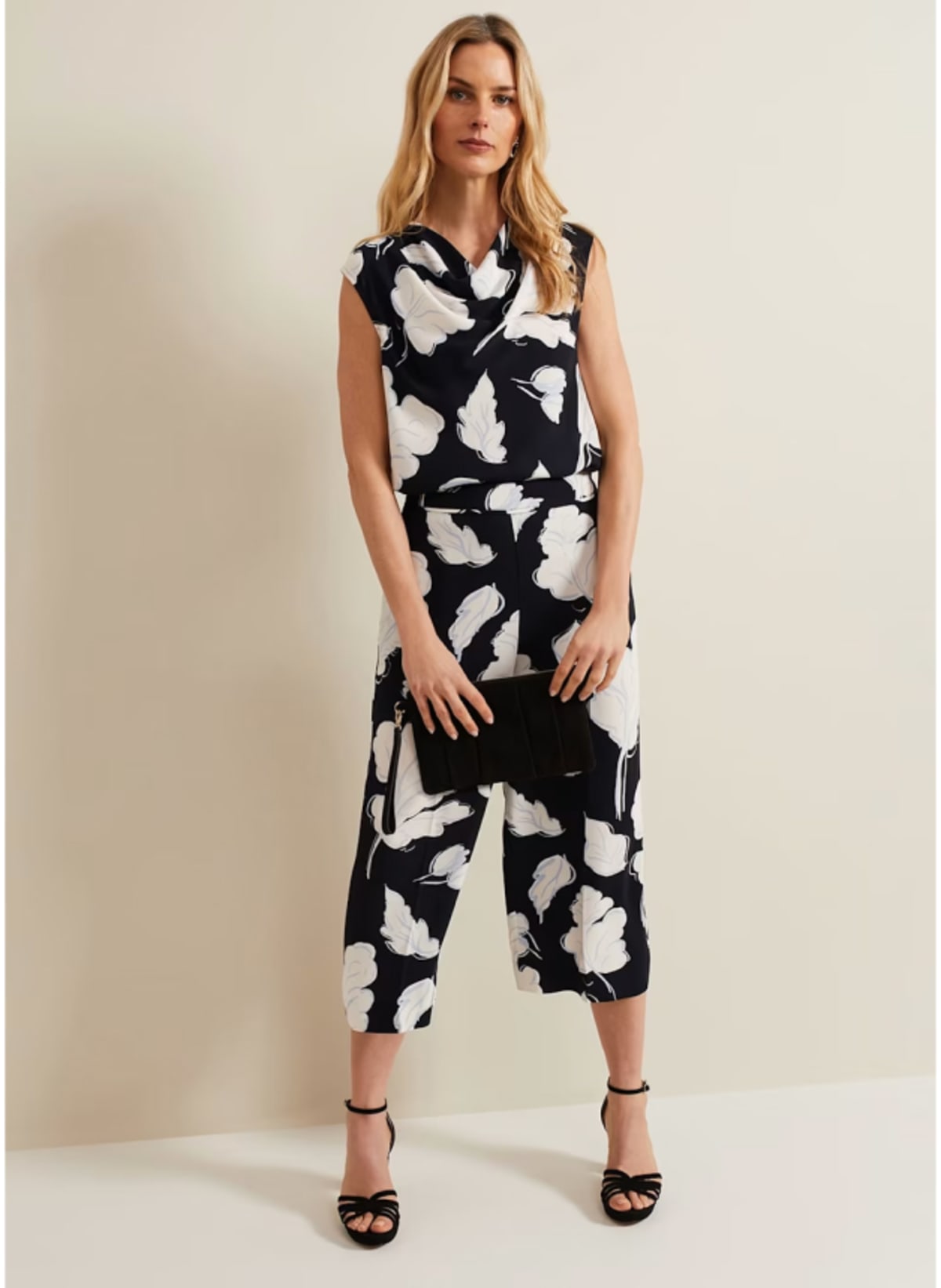 Woman wearing Phase Eight monochrome leaf print coord