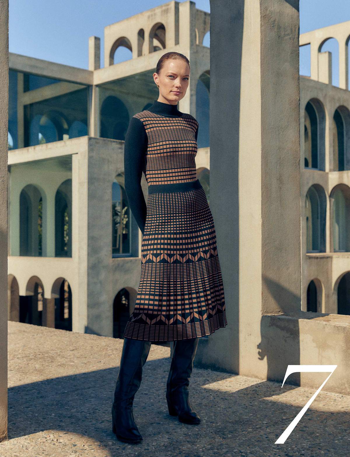 Woman wearing Phase Eight knitted dress
