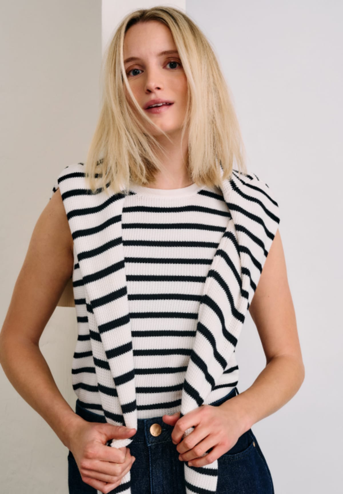 Woman wearing Phase Eight Striped Top and Jumper