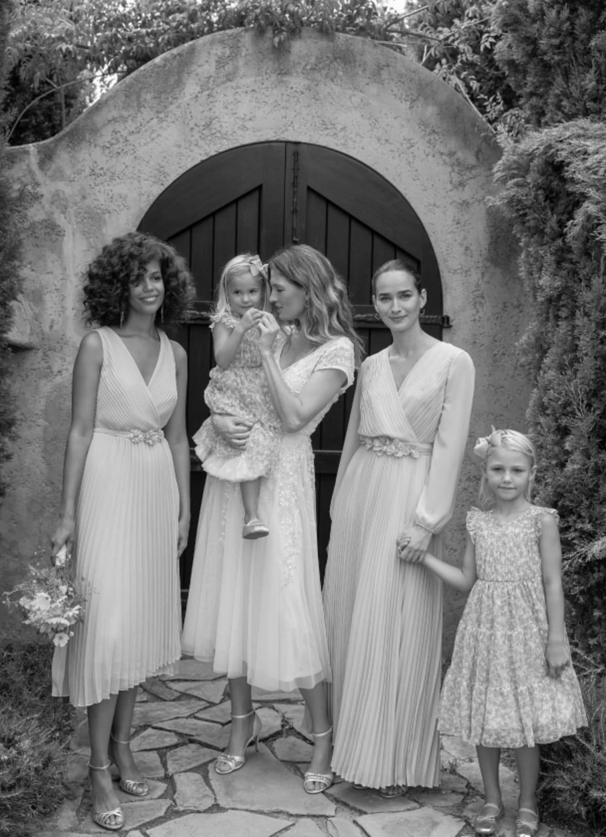 Women wearing Phase Eight bridesmaid dresses