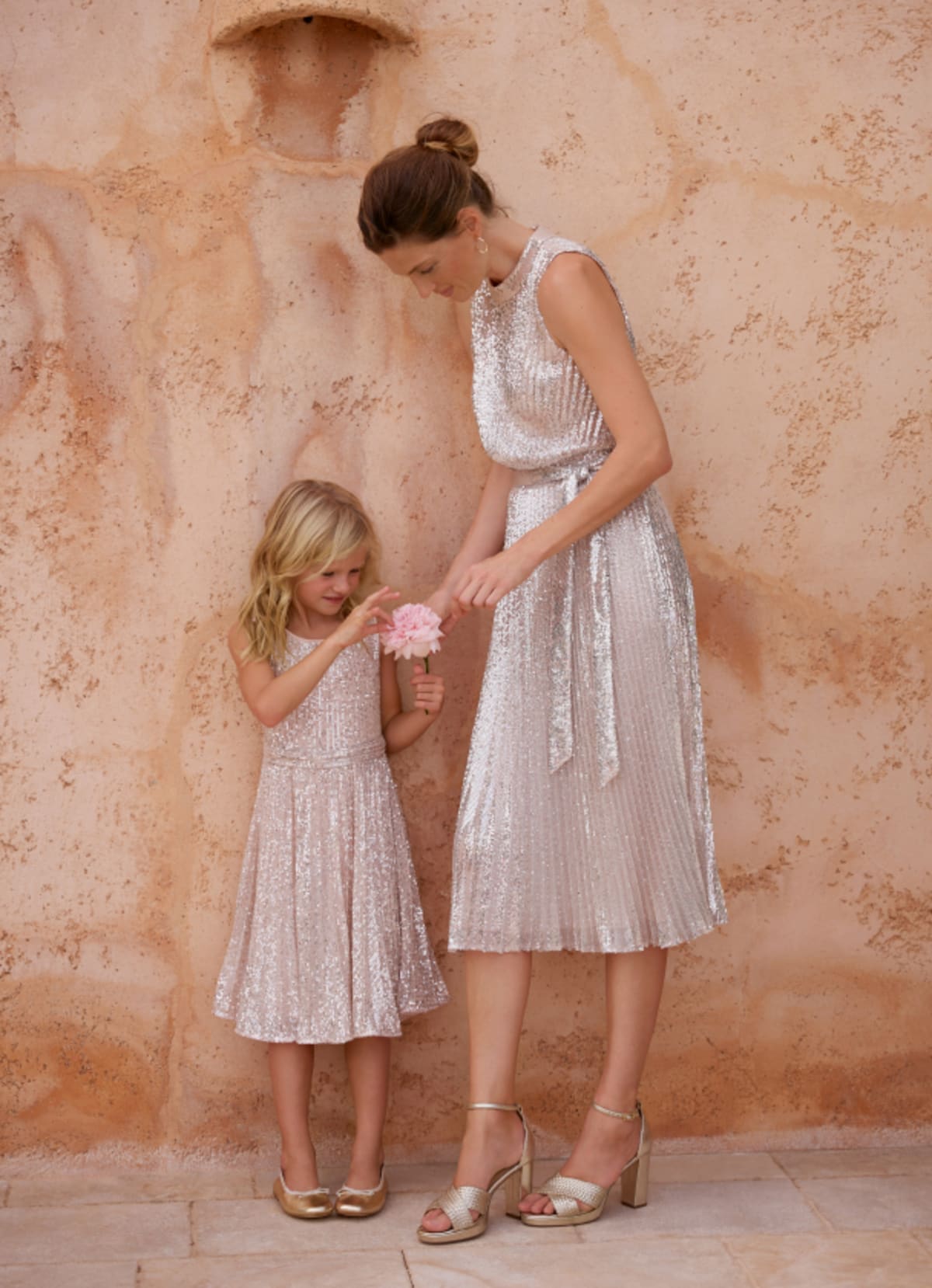 Woman wearing Phase Eight sequin dress