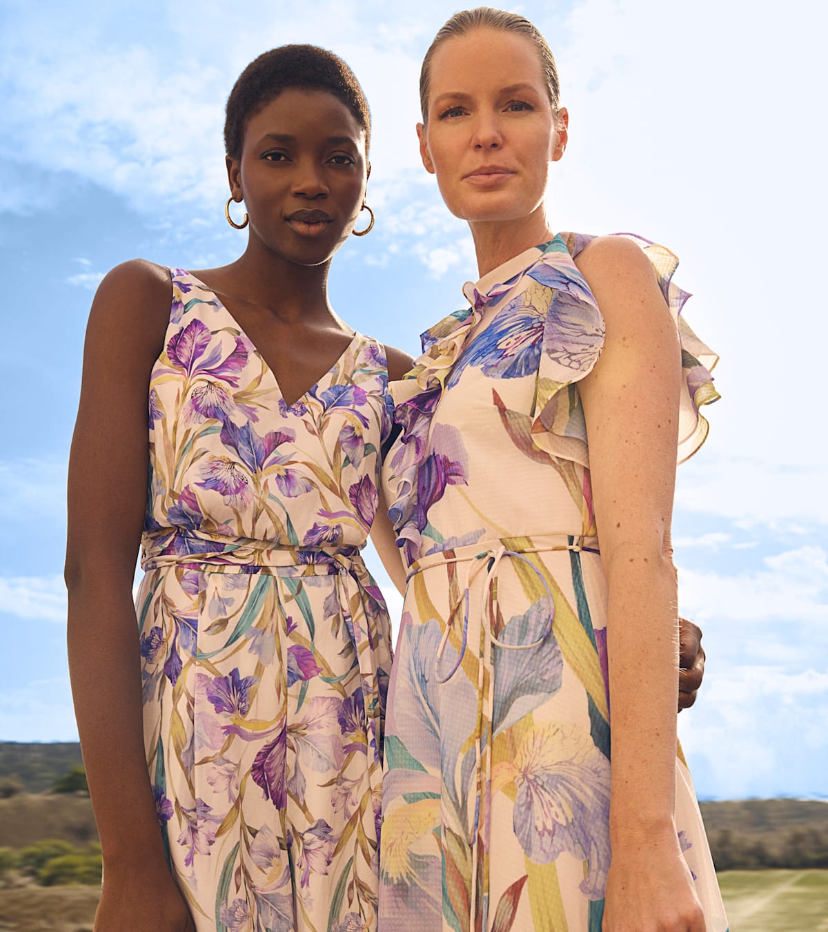 Women wearing Phase Eight dresses