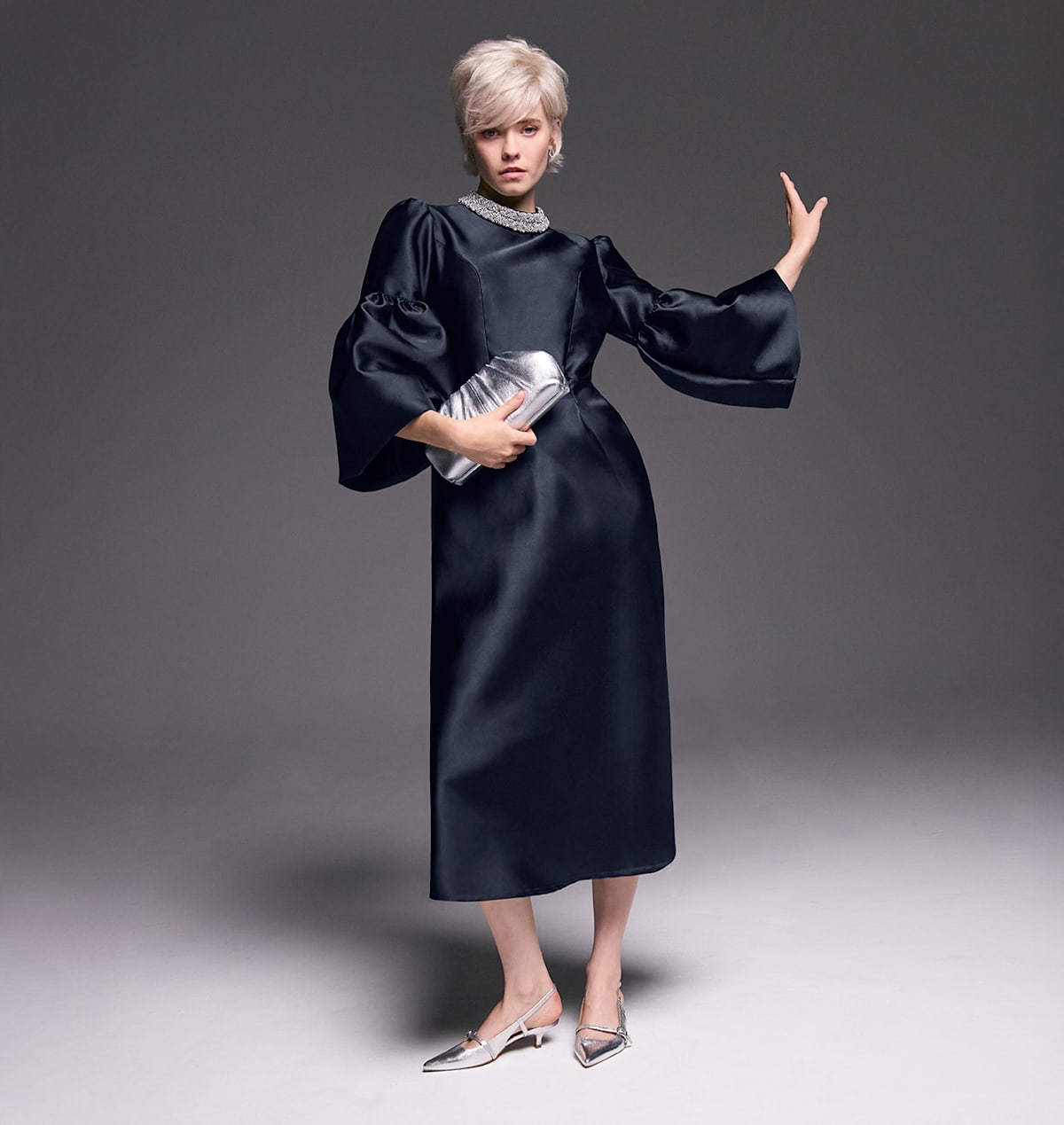 Woman wearing Phase Eight limited edition event dress