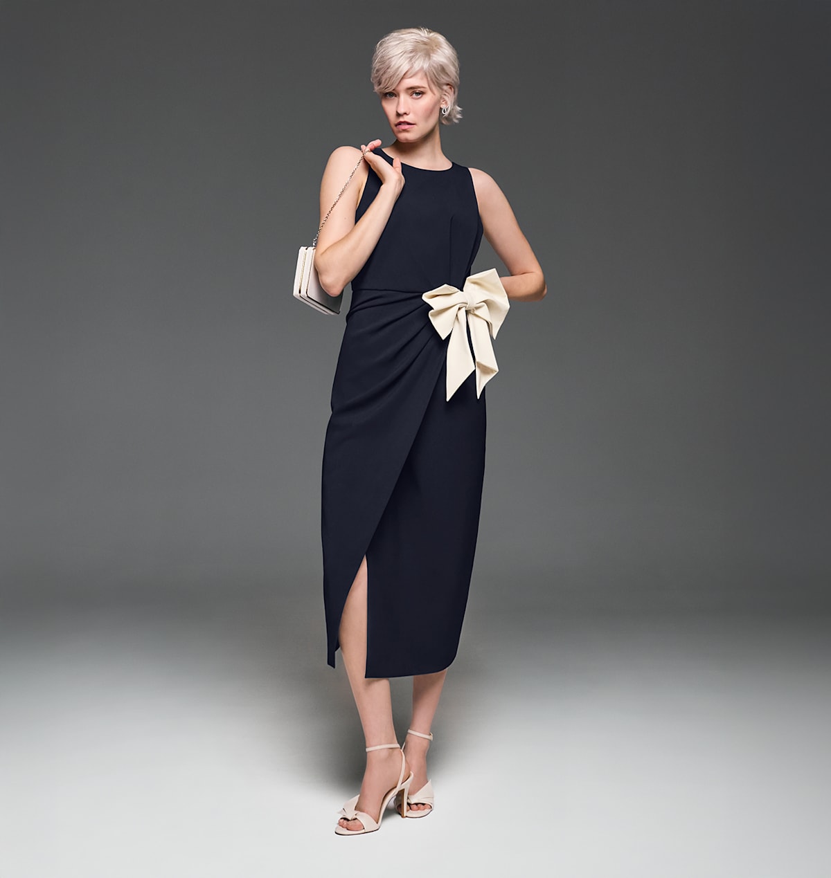 Woman wearing Phase Eight limited edition dress
