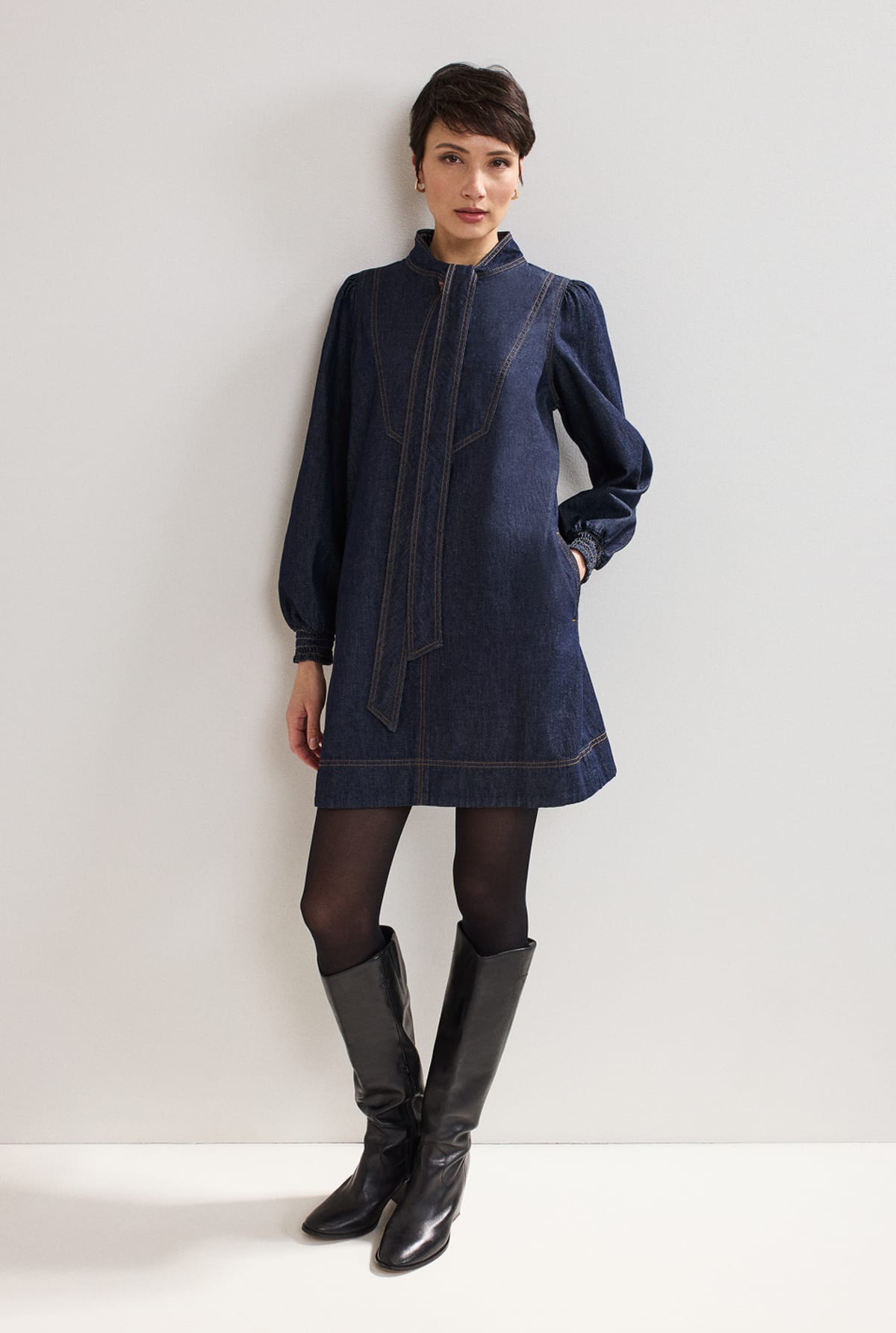 Woman wearing Phase Eight mini dress
