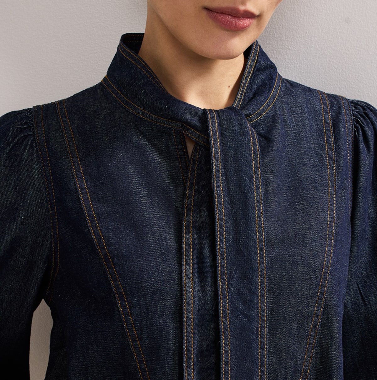 Woman wearing Phase Eight mini dress