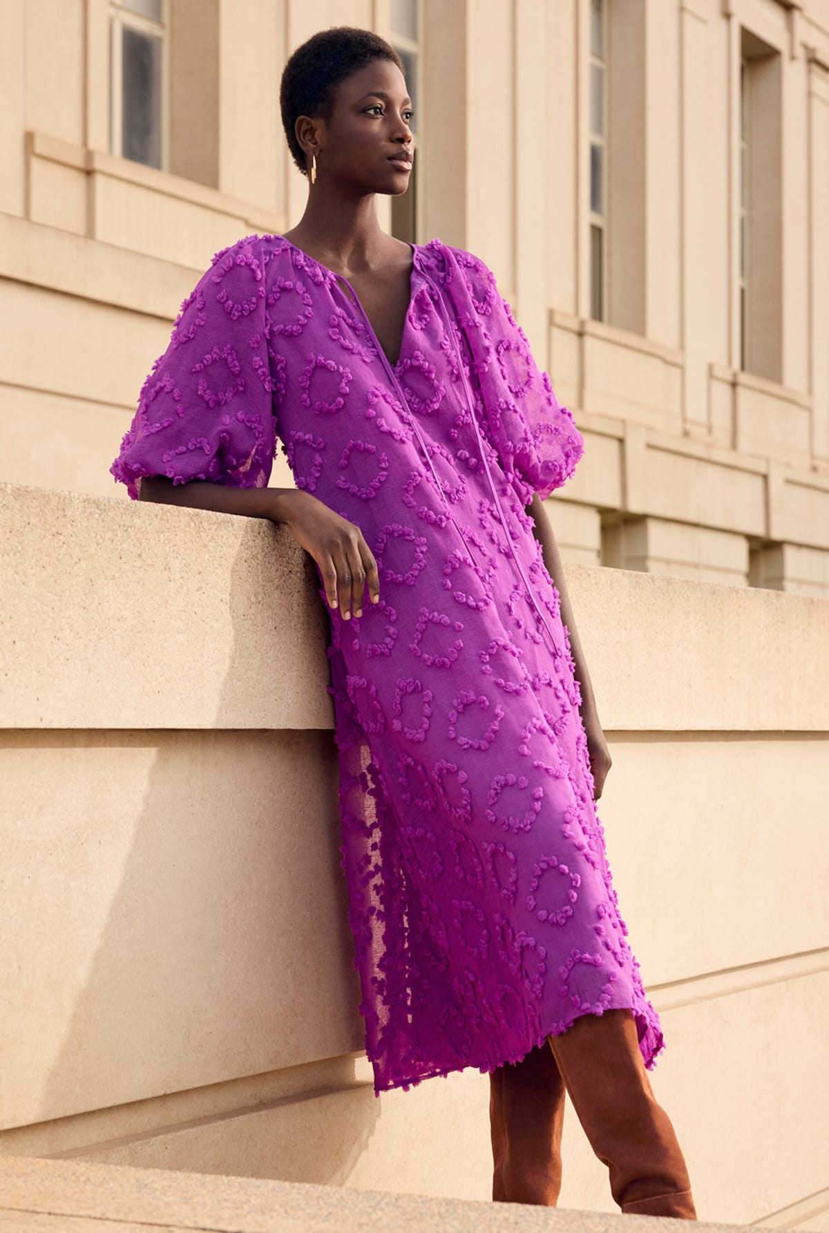 Woman wearing Phase Eight printed dress