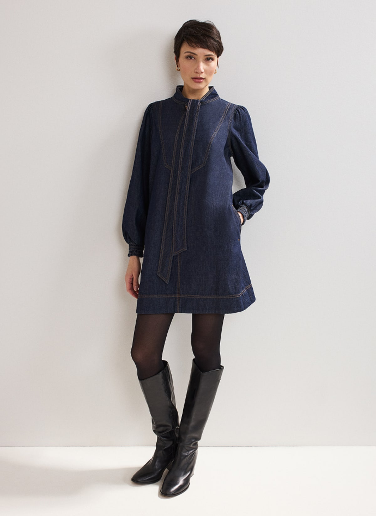Woman wearing Phase Eight mini dress