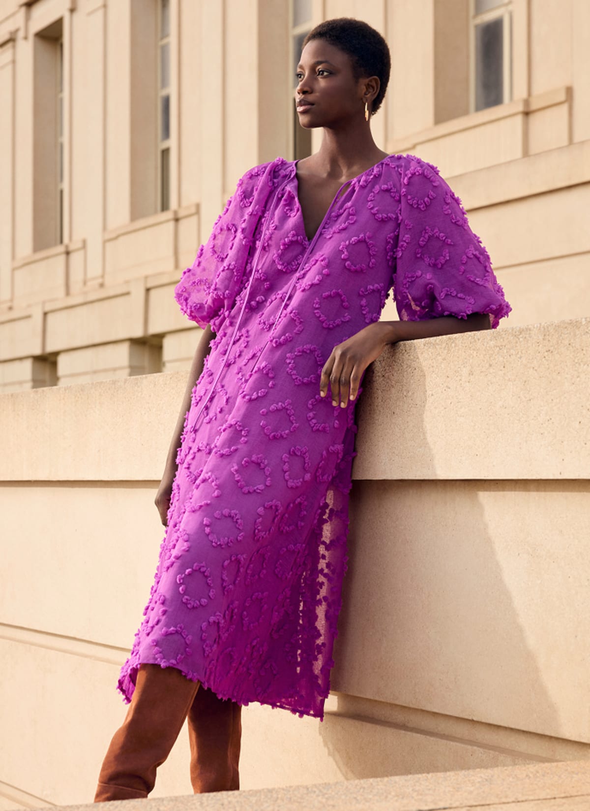 Woman wearing Phase Eight printed dress