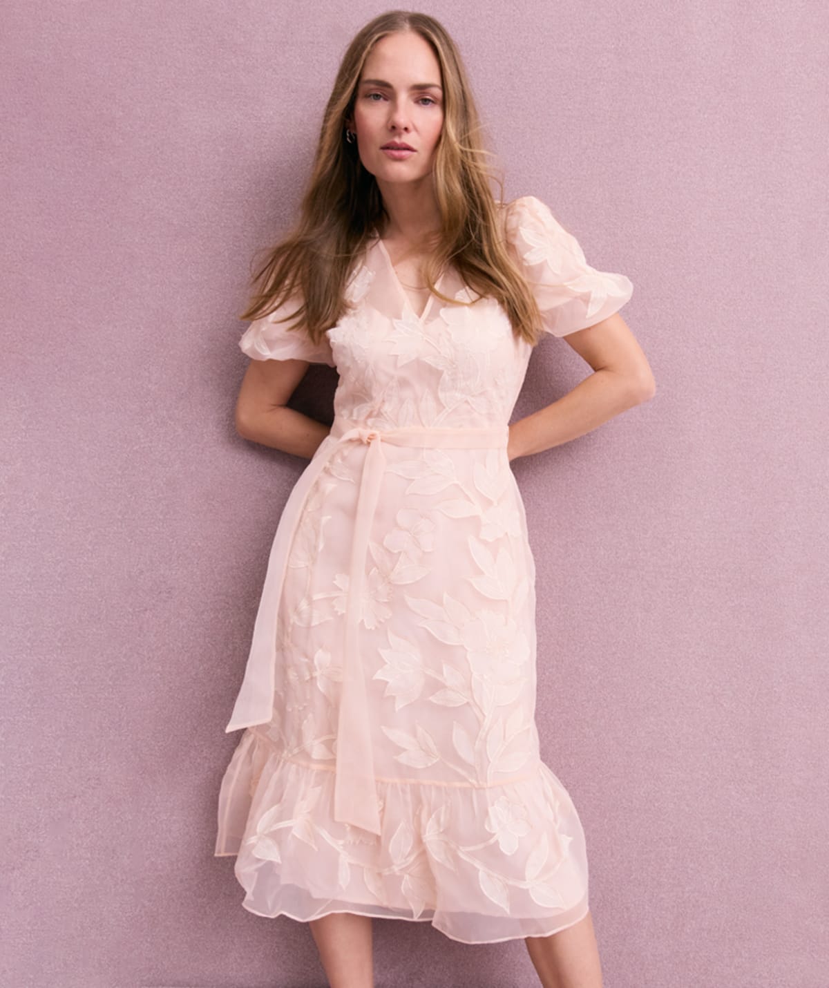 Women wearing Phase Eight pink dress