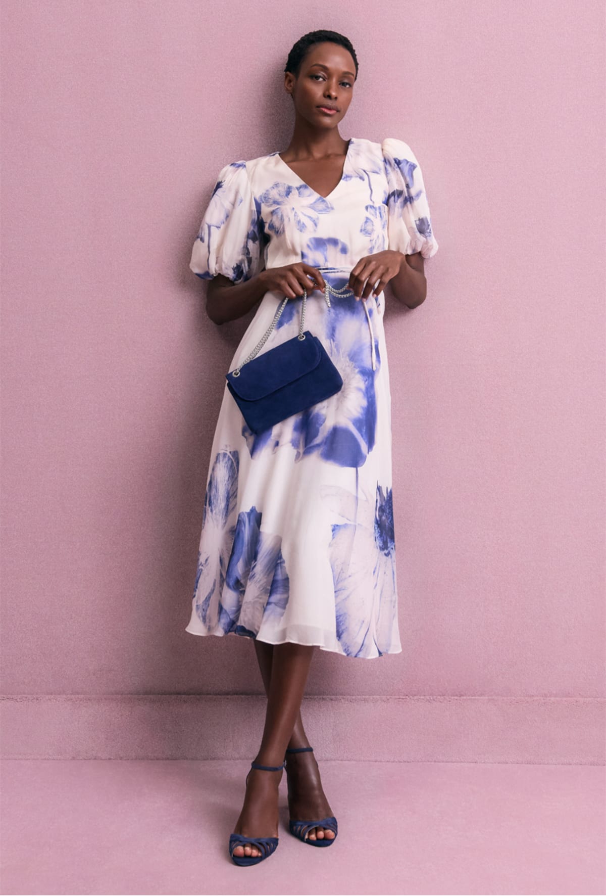 Woman wearing Phase Eight floral dress