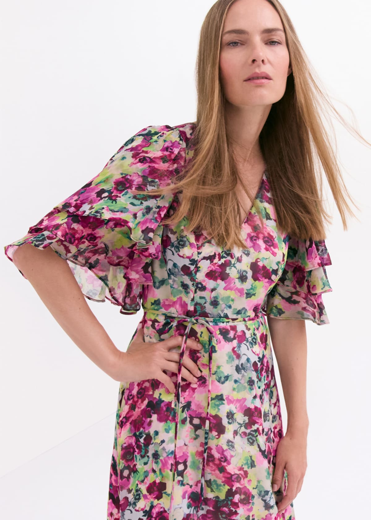 Woman wearing Phase Eight floral maxi dress