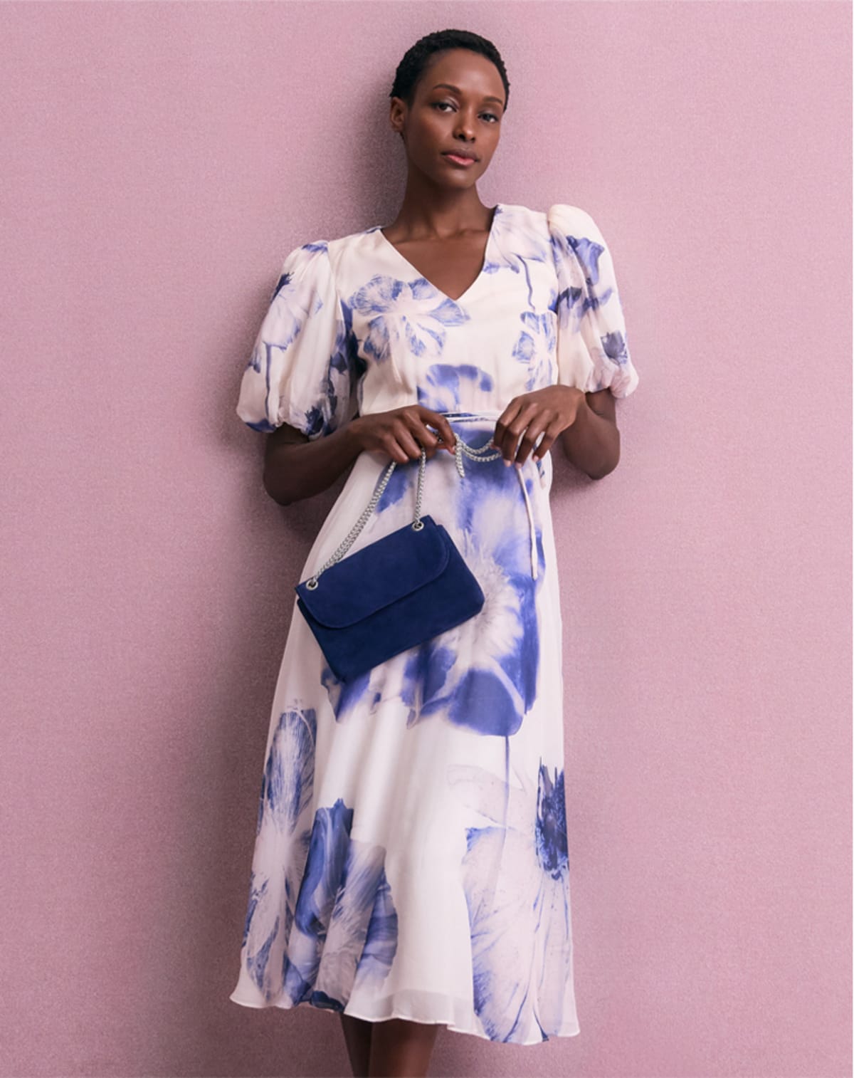 Woman wearing Phase Eight floral dress