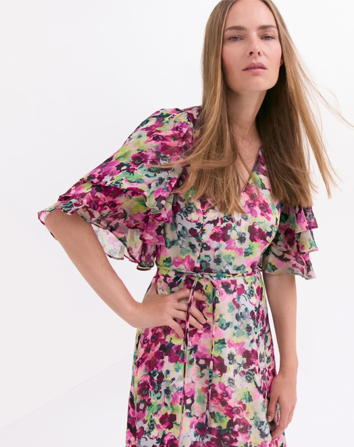 Woman wearing Phase Eight floral maxi dress